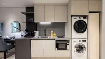 Executive Twin Room | Private kitchen | Dining tables