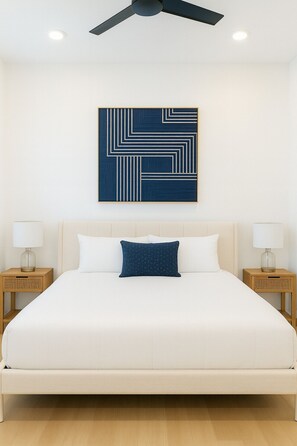 Tabla de planchar con plancha, wifi y ropa de cama