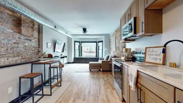 Fridge, microwave, stovetop, coffee/tea maker