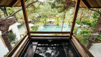 Deluxe Double Room, Courtyard View | Bathroom | Free toiletries, hair dryer, bathrobes, slippers