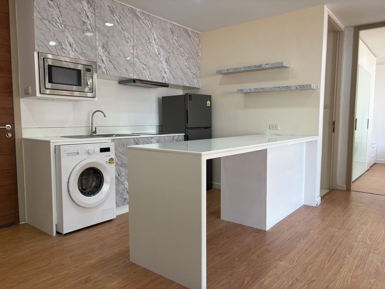 Toaster, freezer, ice maker, dining tables