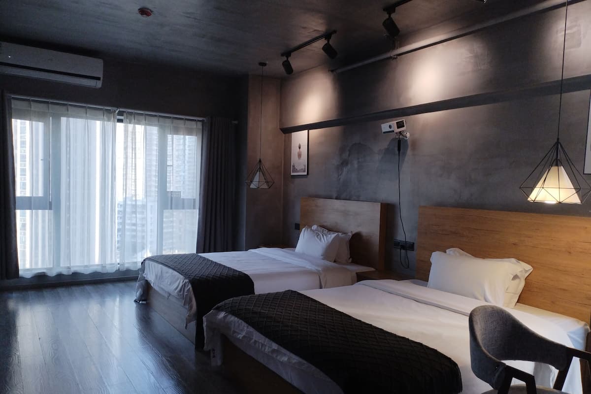Habitación Confort con 2 camas individuales, vistas a la ciudad | Wifi gratis