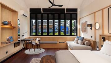 Signature Suites | Free minibar items, in-room safe, desk, laptop workspace