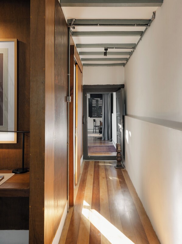 Family Townhome, City View | In-room safe, desk, laptop workspace, iron/ironing board