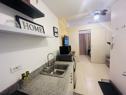 1BR unit in Cool Suites, Wind Residences Tagaytay, smart tv and access to pool.