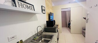 1BR unit in Cool Suites, Wind Residences Tagaytay, smart tv and access to pool.