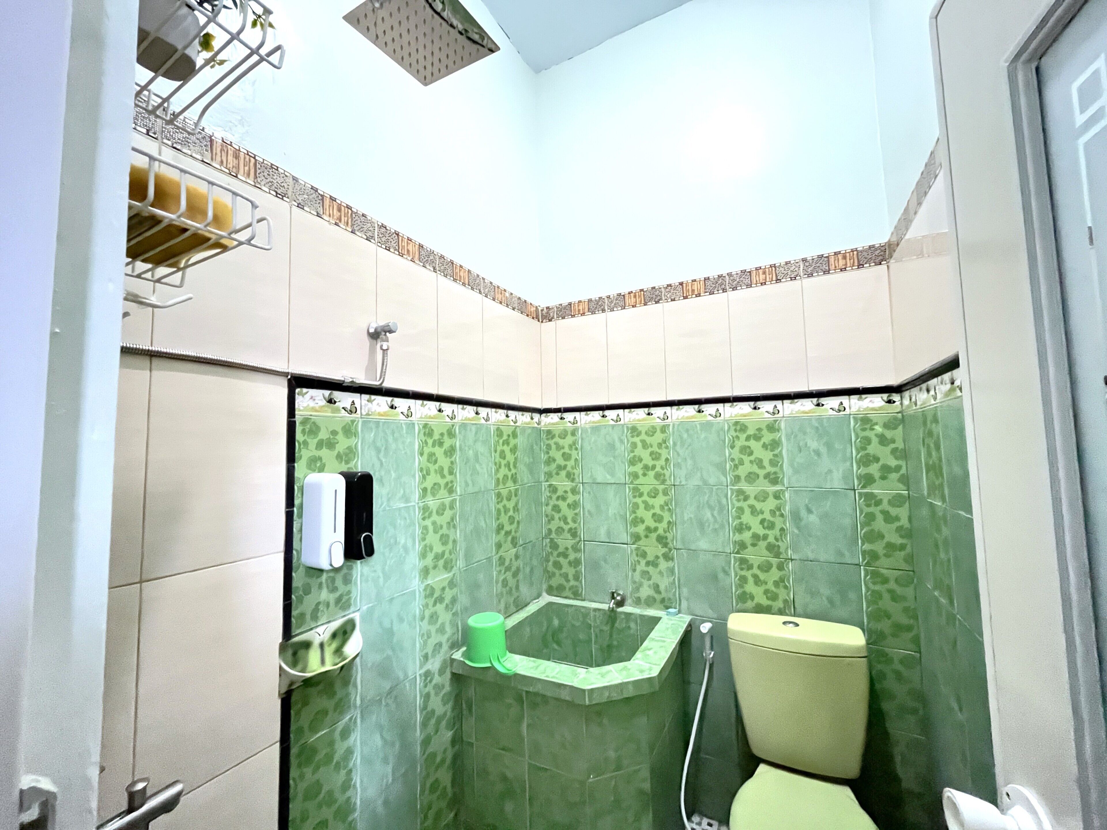 Shower, slippers, towels, soap
