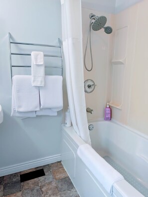 Hair dryer, towels, soap, shampoo