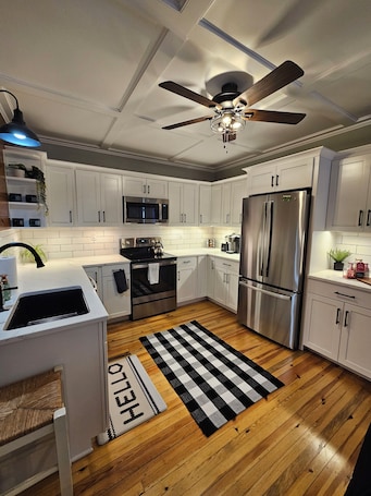 Fridge, microwave, oven, stovetop. 4-bedroom House with attached In-Law suite