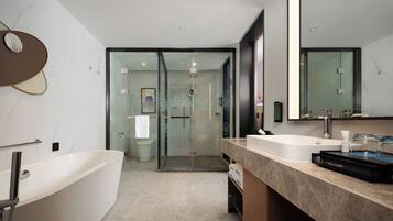 Luxury Suite, Mountain View | Bathroom | Separate bathtub and shower, hair dryer, slippers, towels