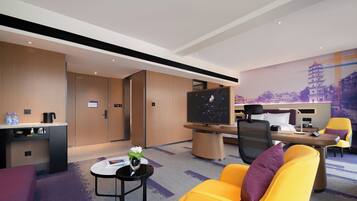 Luxury Suite, Mountain View | Desk, laptop workspace, blackout drapes, iron/ironing board