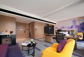 Luxury Suite, Mountain View | Desk, laptop workspace, blackout drapes, iron/ironing board