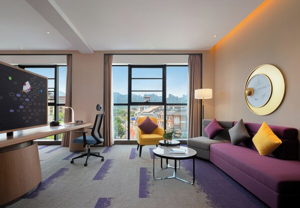 Luxury Suite, Mountain View | Desk, laptop workspace, blackout drapes, iron/ironing board