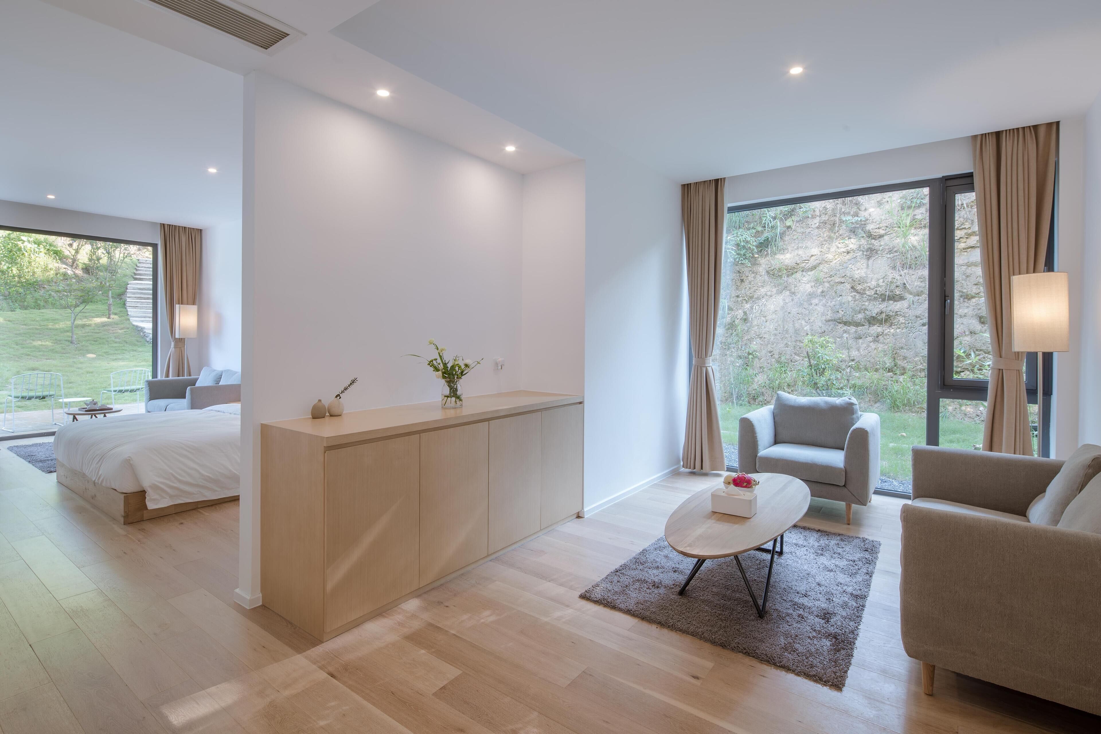 Standard Suite, Courtyard View | Desk, laptop workspace, blackout drapes, iron/ironing board