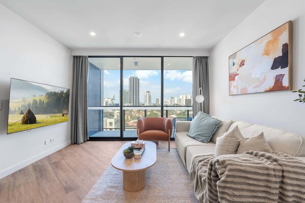 Living area - The Regal -  Modern LUX 2BR High-Floor apt with Ocean Views and Pool (Southport)