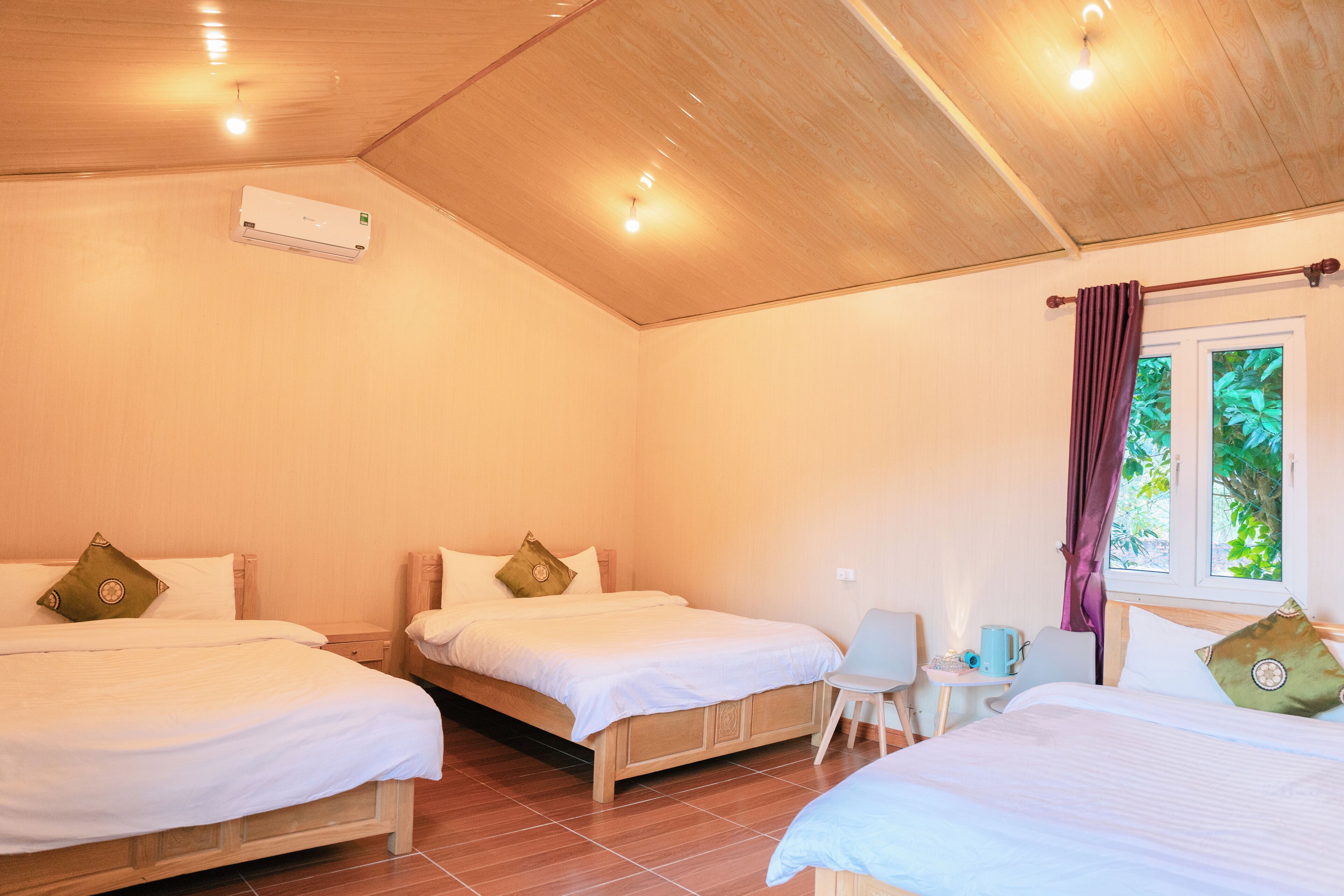 Family Triple Room, Garden View | Desk, laptop workspace, free WiFi, bed sheets