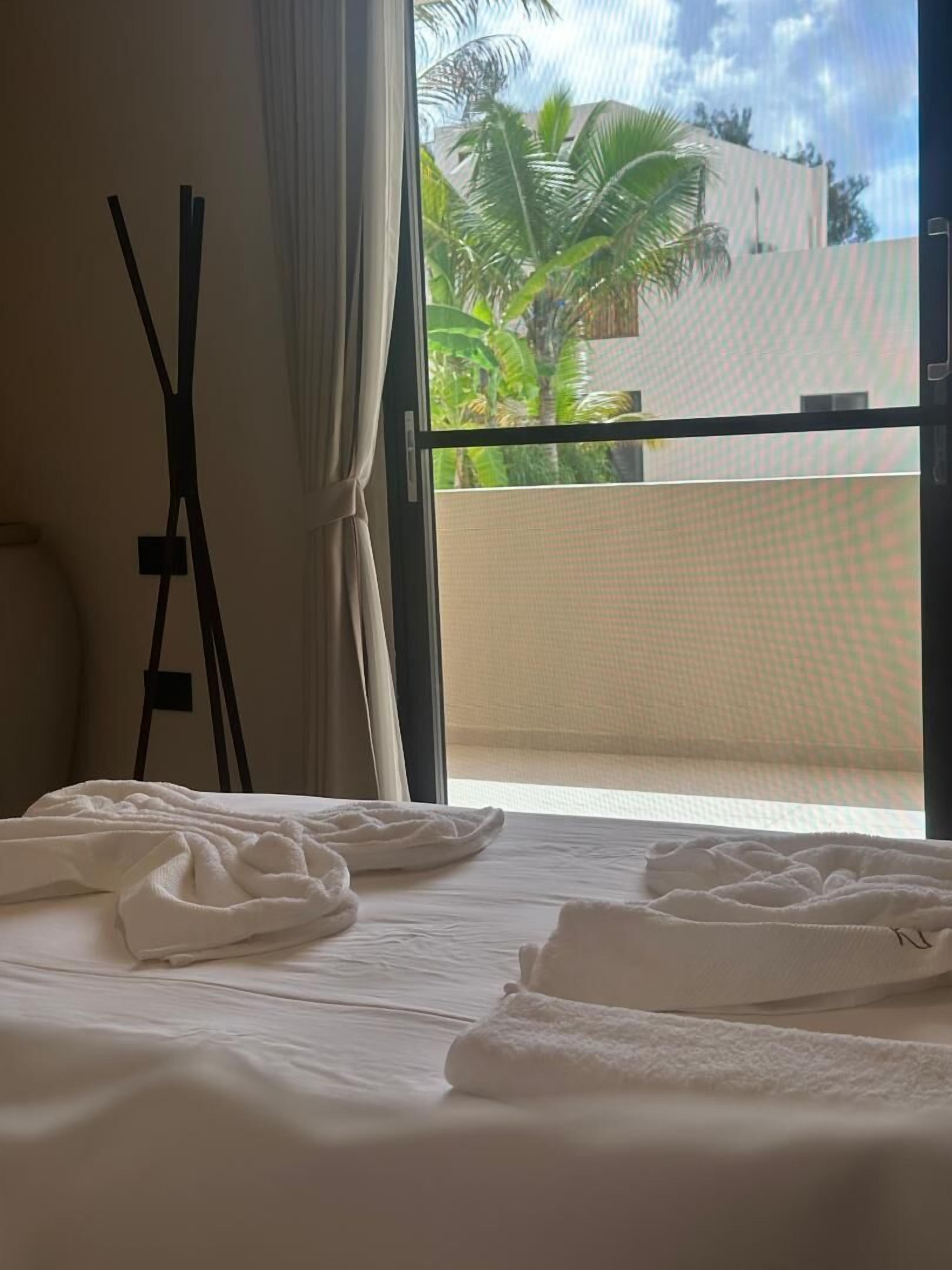 Apartamento familiar | Sábanas de algodón egipcio y ropa de cama de alta calidad