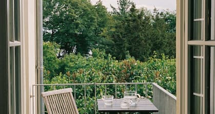 Remise am Mühlenberg – Ferienhaus mit großem Garten & Badesteg an der Havel