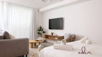 Een strijkplank/strijkijzer, wifi, beddengoed