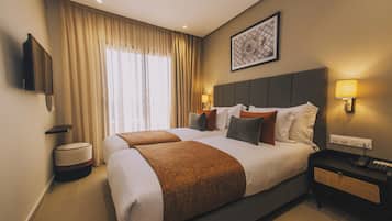 Habitación ejecutiva con 1 cama matrimonial o 2 individuales | Ropa de cama de alta calidad, cunas gratuitas y wifi gratis