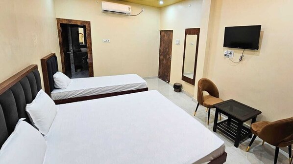 Habitación familiar | Camas extra, wifi gratis y ropa de cama