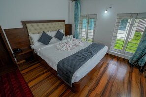 Executive Double Room | Desk, blackout drapes, bed sheets - RG The Grand Haven Resort  (Chikkamagaluru)