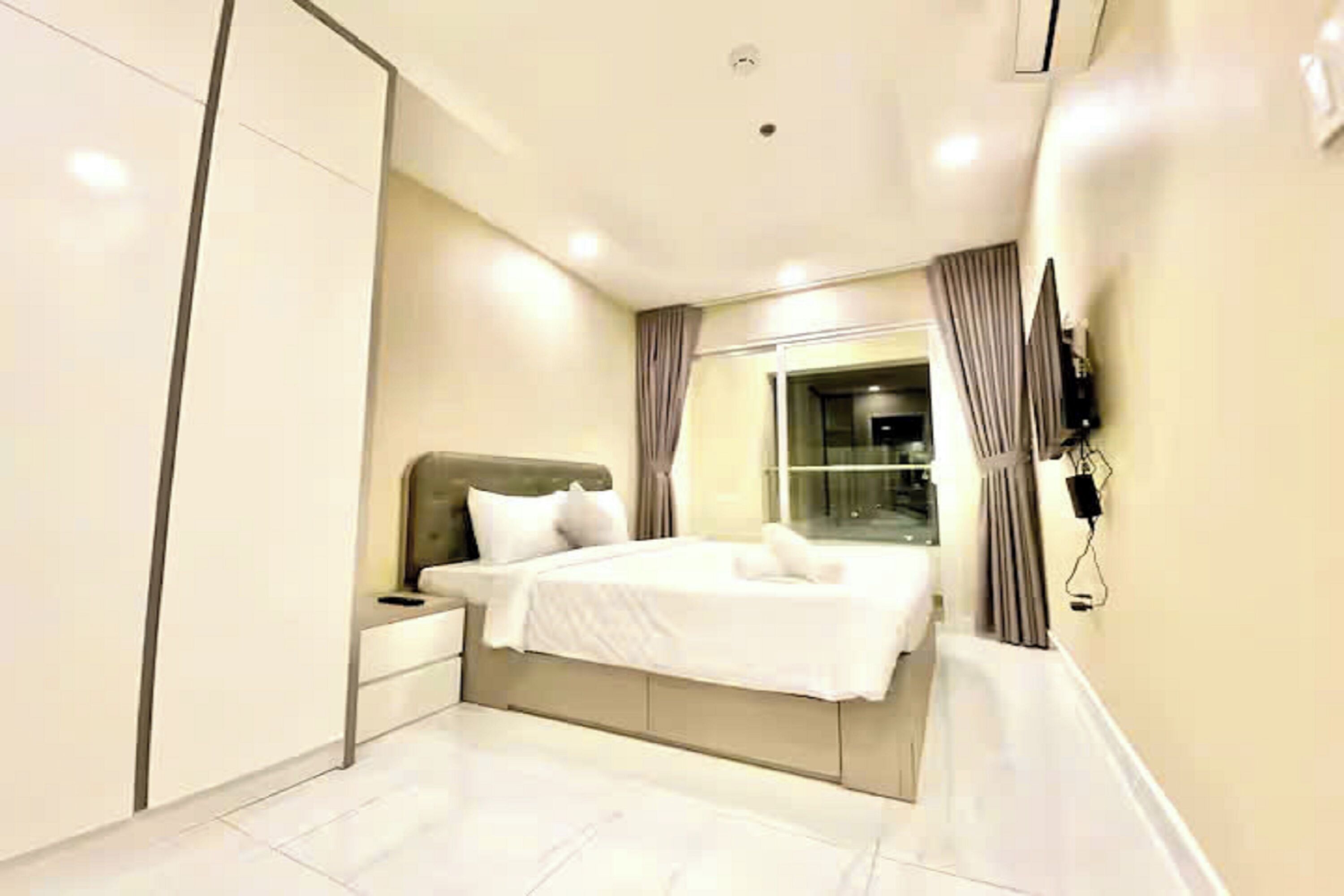 プレミア スイート 2 ベッドルーム クラブラウンジ利用可 シティビュー | エジプト綿のシーツ、高級寝具、羽毛の掛け布団、セレクト コンフォート製ベッド