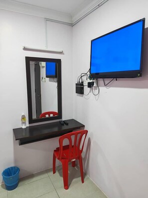 Habitación individual Deluxe | Escritorio, wifi gratis y ropa de cama