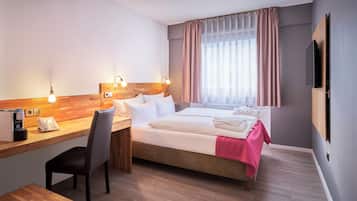 Hypoallergeen beddengoed, een kluis op de kamer, een bureau