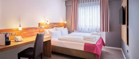 Hypo-allergenic bedding, in-room safe, desk, laptop workspace