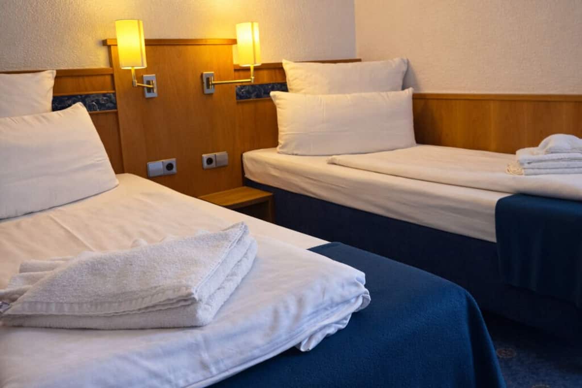 Hypo-allergenic bedding, in-room safe, desk, laptop workspace