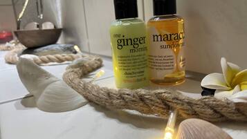 Hair dryer, towels, soap, toilet paper