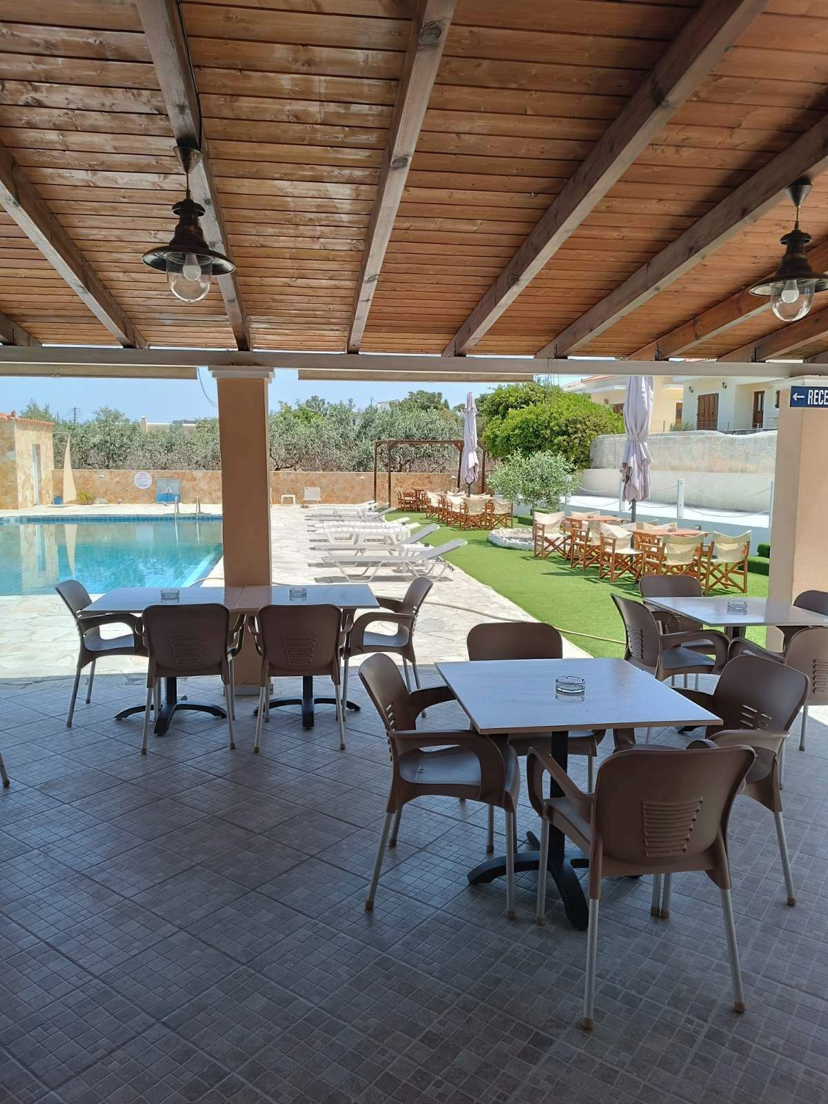 Seasonal outdoor pool, open 9:00 AM to 9:00 PM, pool loungers