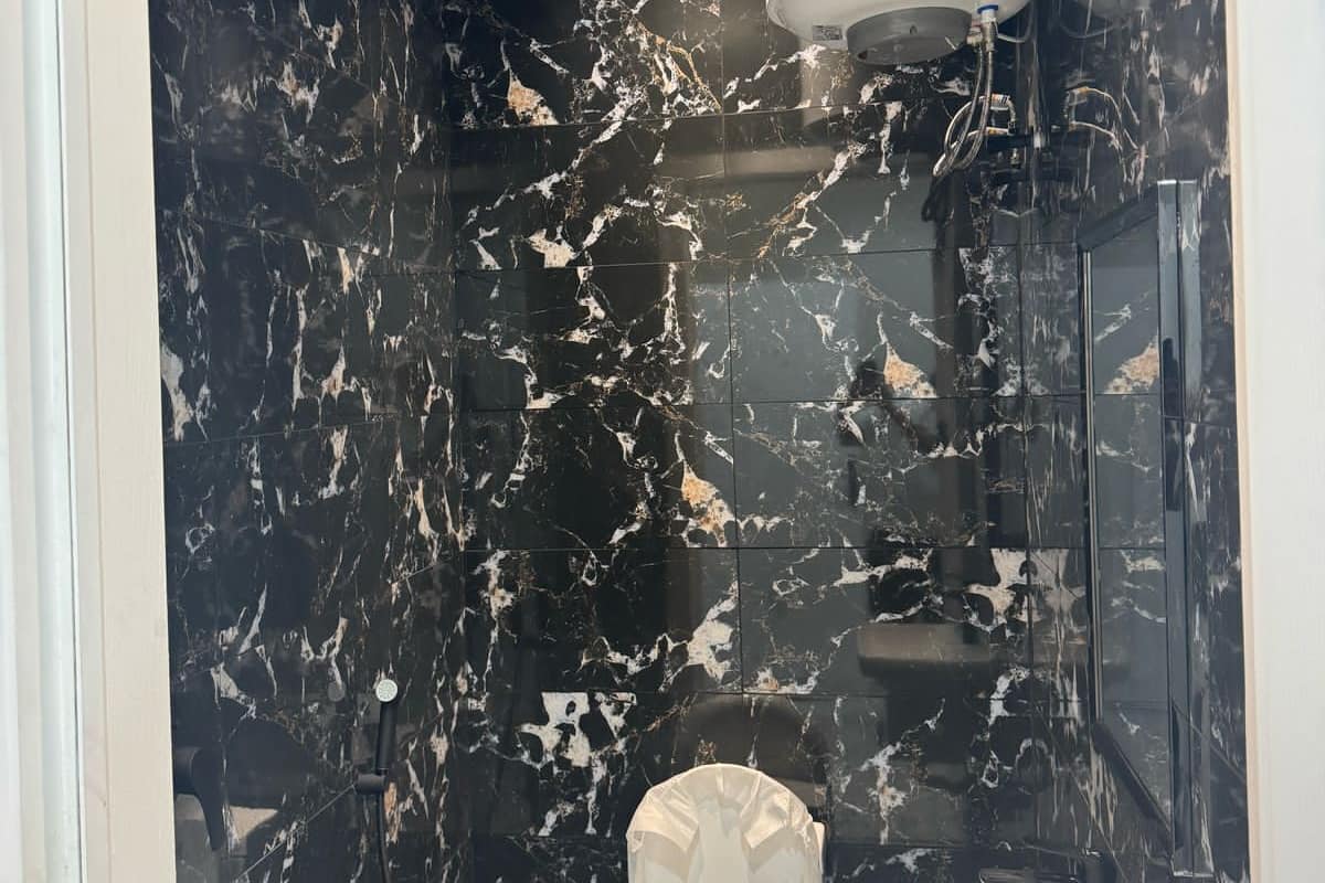 Ducha, toallas, jabón y champú