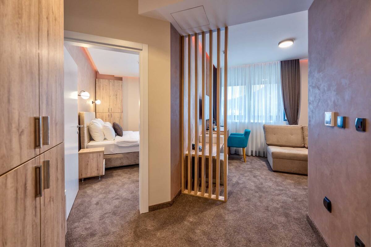 Comfort Apartment, City View | In-room safe, desk, laptop workspace, soundproofing