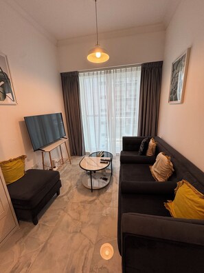 Living area - 1BDH with canal view - Modern comfort fully furnished (Dubai)