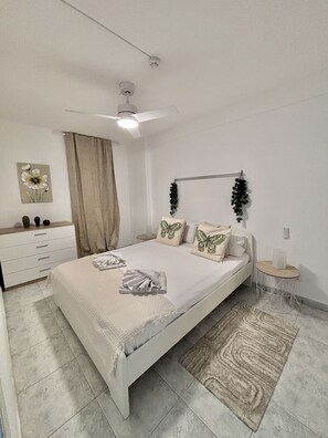 1 dormitorio, tabla de planchar con plancha, wifi gratis y ropa de cama