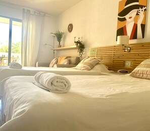 Een strijkplank/strijkijzer, gratis wifi, beddengoed