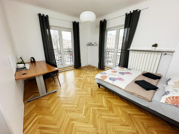 Classic Quadruple Room, 2 Double Beds | Desk, laptop workspace, iron/ironing board, free WiFi - Fantastic Inn Warsaw - Warecka (Warsaw)