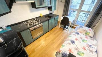 Klassieke eenpersoonskamer, 1 eenpersoonsbed | Een bureau, een laptopwerkplek, een strijkplank/strijkijzer, gratis wifi