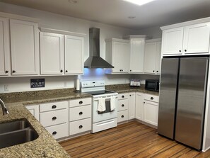 Private kitchen - Another Adventure awaits your Arrival.  Charming 2 Bed / 2 Bath with Hangar! (Diamondhead)