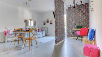 Apartment, Balcony, Mountain View | Living area | Flat-screen TV