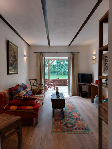 Liebevoll eingerichtete, ebenerdige Ferienwohnung, mit Terrasse und Garten