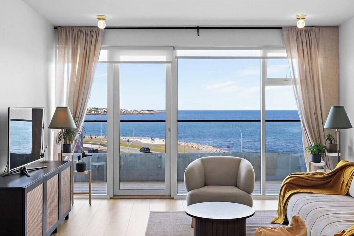 Apartment, Ocean View | Living area | 55-inch Smart TV with satellite channels, heated floors