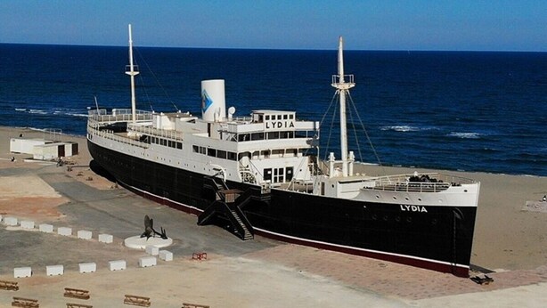 A large ship named 'LYDIA' docked at a beach with a clear sky. - Seafront apartment (Le Barcarès)