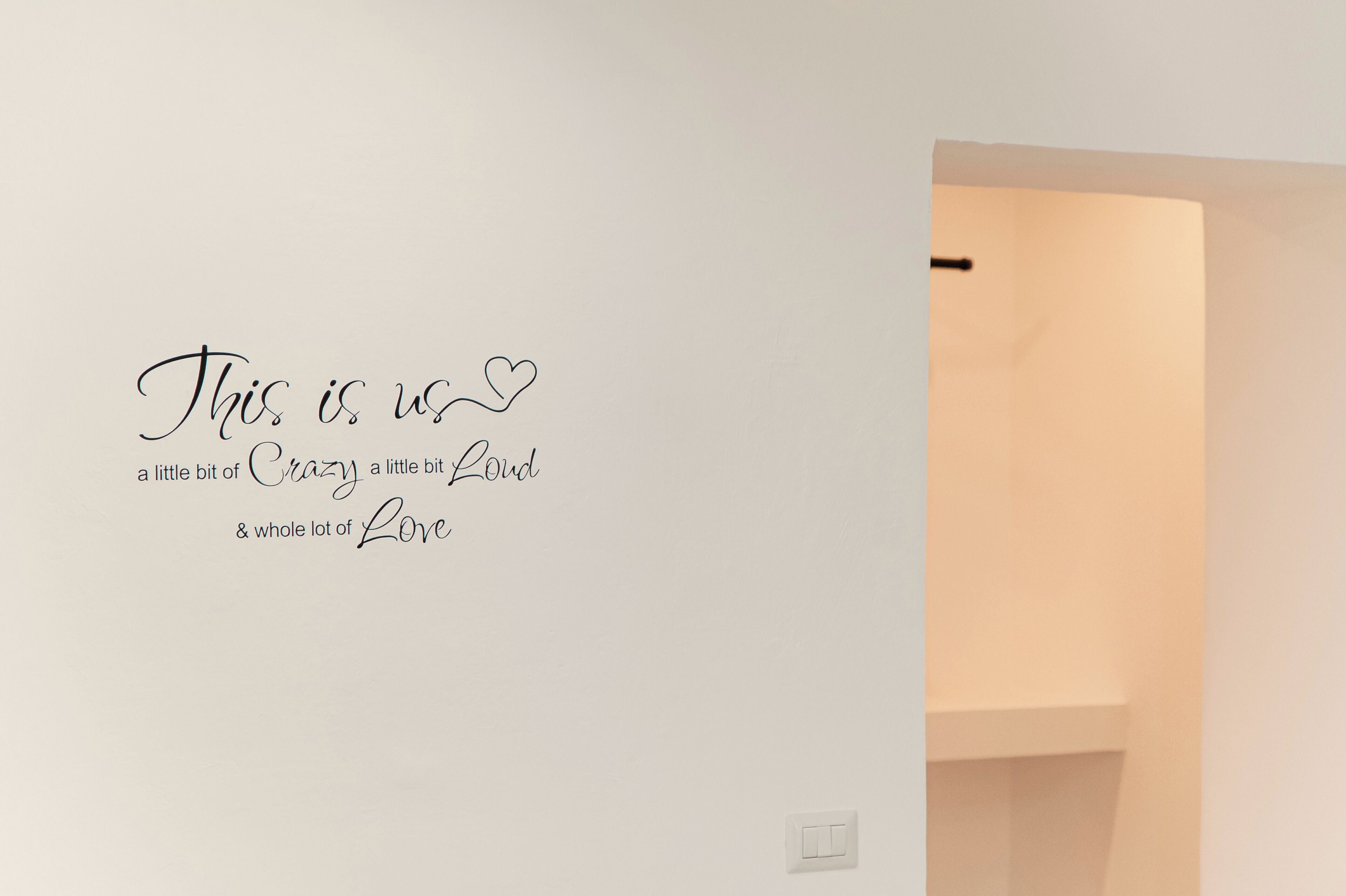 A wall with a motivational quote.