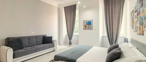 Premium bedding, down comforters, iron/ironing board, cribs/infant beds