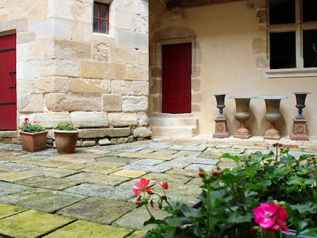 Exterior detail. Medieval studio in village center, near shops