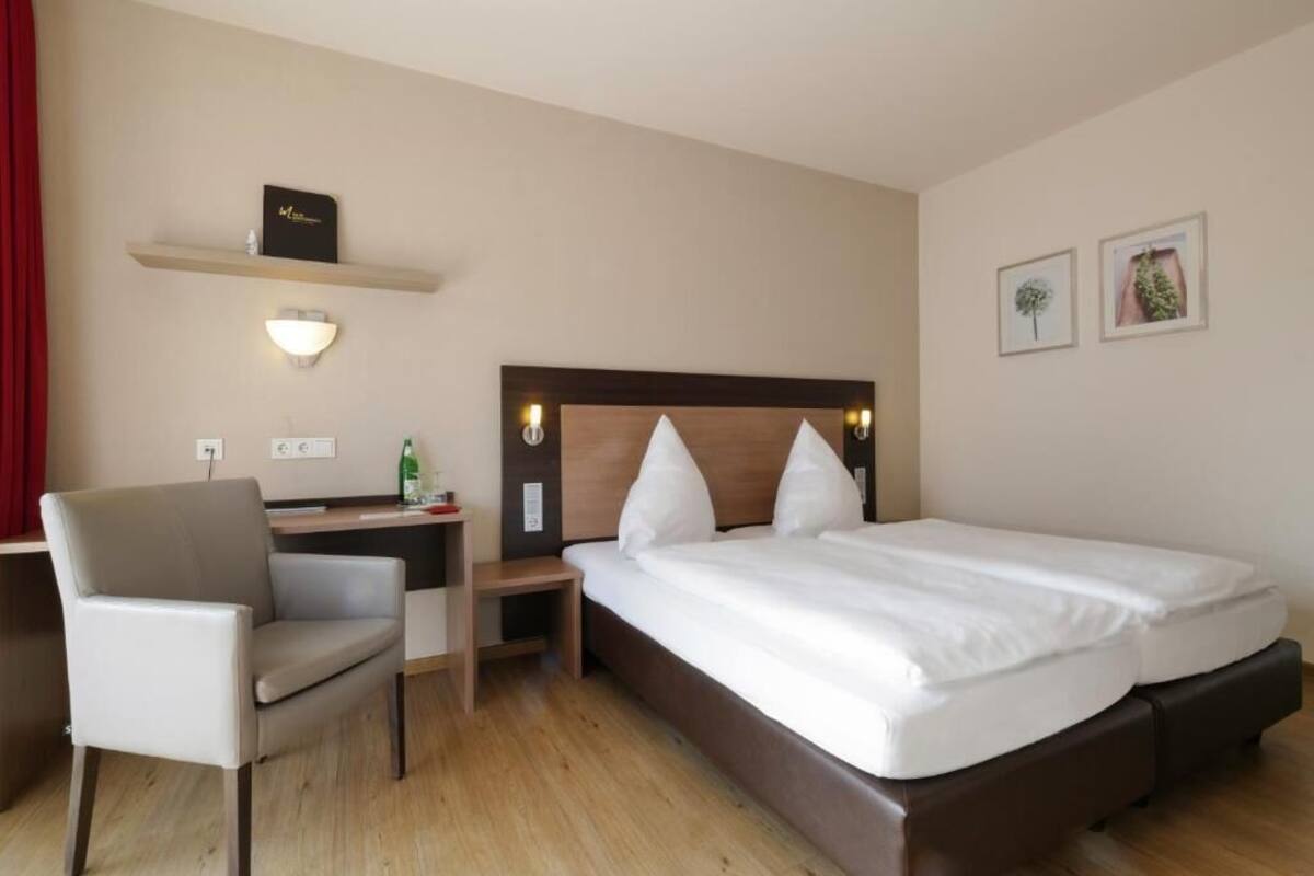 Comfort Double Room Single Use, Balcony | In-room safe, desk, WiFi (free)