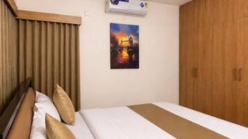 Deluxe Apartment, 2 Bedrooms | Desk, blackout drapes, soundproofing, iron/ironing board